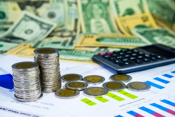 Financial diagram with coins and calculator,