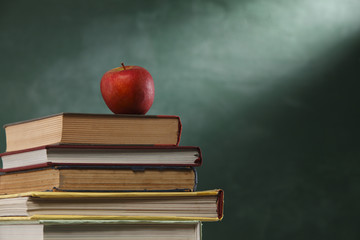 apple on stack of book