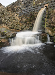 Fototapeta na wymiar Overflow chutes on a small stream