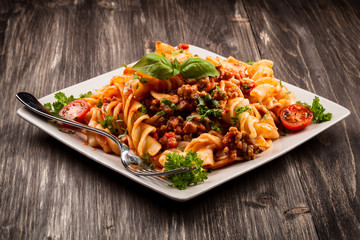 Pasta with meat, tomato sauce and vegetables