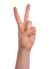 woman's hand showind sign of victory