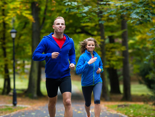 Healthy lifestyle - woman and man running