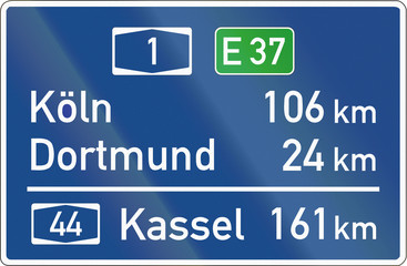 German sign showing destinations and distances