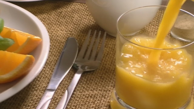 Breakfast with croissant end orange juice