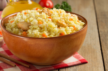 bowl full of rice on wood