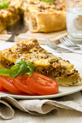 meat pie on a wooden background