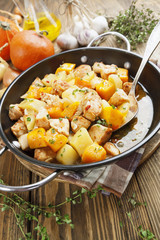 Chicken stew with pumpkin, potatoes and spices