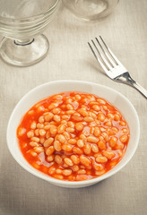 Bowl of baked beans in tomato sauce