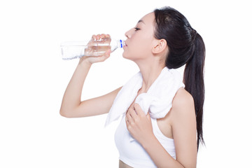 healthy asian woman with towel and water bottle