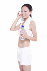 healthy asian woman with towel and water bottle