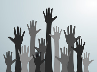 Various hands lifted up in the air. Many gray people's hands up