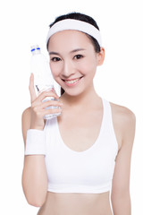 healthy asian woman with towel and water bottle