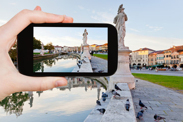 tourist taking photo of Prato della Valle in Padua
