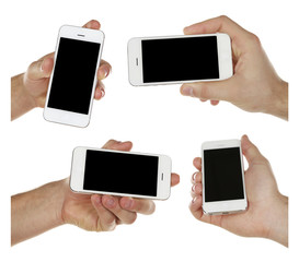 Hands holding smartphones isolated on white