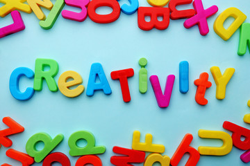 Fototapeta premium Creativity motto by alphabet letters on colorful background