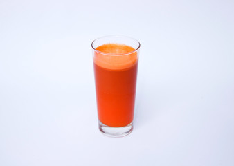 Carrot Juice in Glass Isolated on White Background