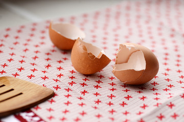 Eggs broken shells on the kitchen table