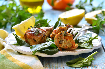 Roasted chicken legs stuffed with carrot and mushrooms.