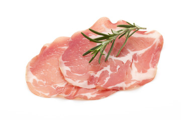 Dried pig meat slices. Delicatess.