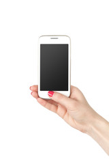 Woman showing white smartphone in hand. Isolated background