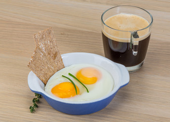 Breakfast with eggs and coffee