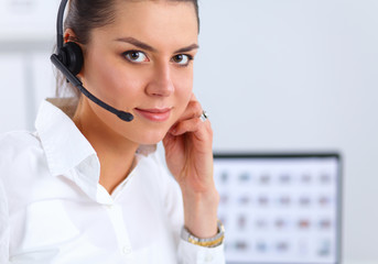 Close-up portrait of a customer service agent sitting at office