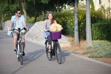 people riding rental or hire bikes