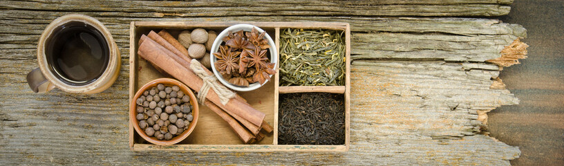Obraz na płótnie Canvas Ingredients for Chai tea in a horizontal format