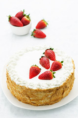 cake with cream and strawberries