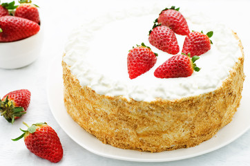 cake with cream and strawberries