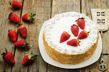 cake with cream and strawberries