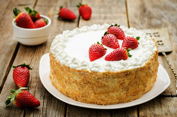 cake with cream and strawberries