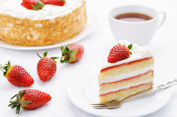 cake with cream and strawberries