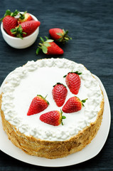cake with cream and strawberries