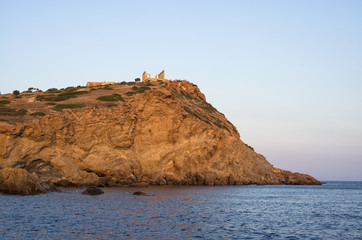 Fototapeta na wymiar Cliff at cape Sounio and the temple of Poseidon, Greece