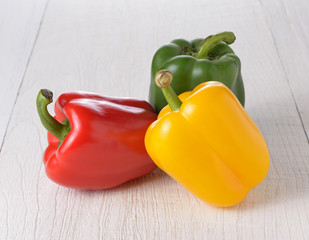 Fresh peppers on wooden