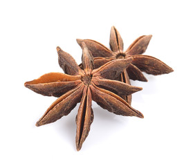 Star anise spice fruits and seeds isolated on white background