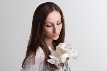 Long Brown Hair Woman with  Subtle Face and White Flower