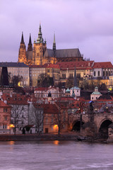 Fototapeta premium Prague gothic Castle with Charles Bridge after sunset