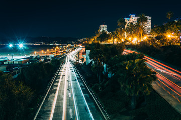 Fototapeta na wymiar Traffic on Pacific Coast Highway at night, in Santa Monica, Cali