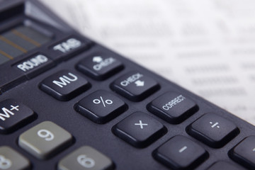 Calculator, pen, folder with documents