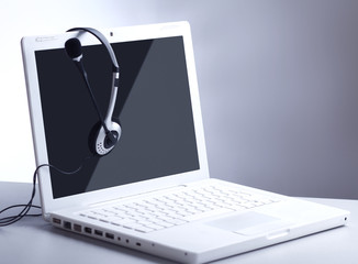 Headset with Laptop on white desk