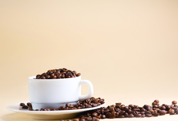 Cup from coffee on  grains