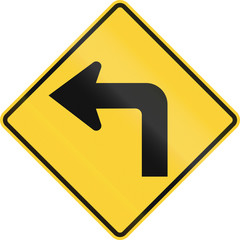 US road warning sign: Left curve ahead