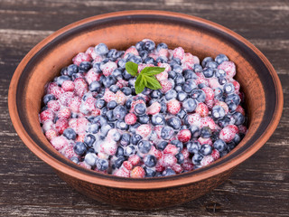 Fresh fruit salad with strawberries and blueberries , wild berry