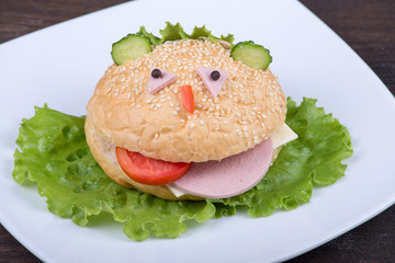 Fun food for kids - hamburger looks like a funny muzzle