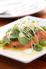 close up raw salmon salad