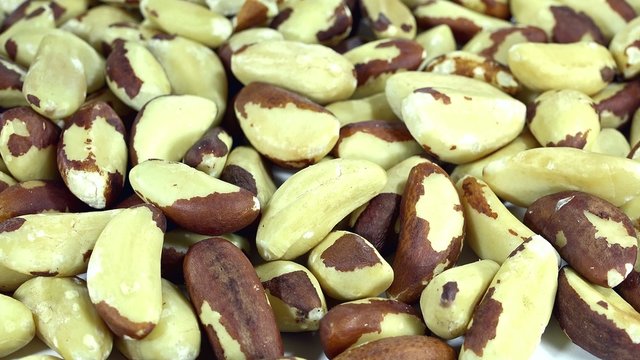 Rotating Brazil Nuts (seamless loopable 4K UHD footage)
