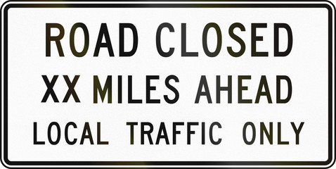 United States traffic sign: Road closed XX Miles Ahead