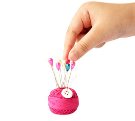 hand pick pin and thread roll isolate on white (clipping path)